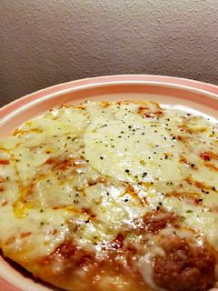 Una foto de Pizza boloñesa 🍕