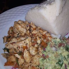 A picture of Scrambled eggs and guacamole.
