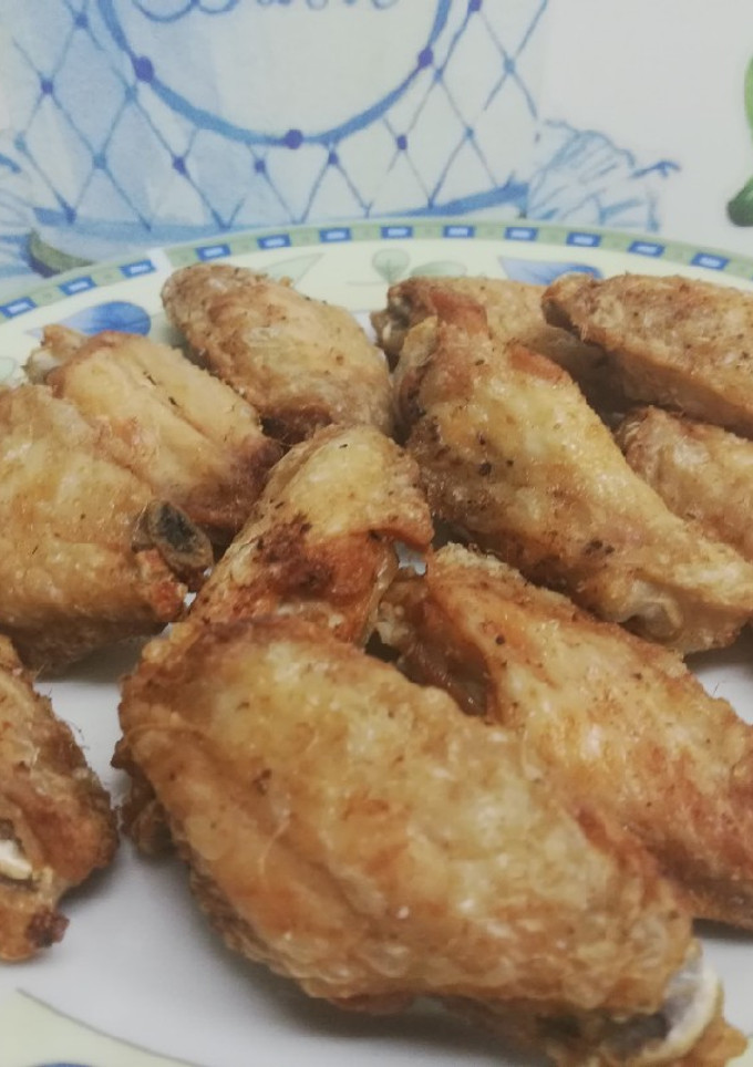 Una foto de Alitas de pollo picantes 🐔🌶️