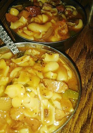 A picture of Full gravy pasta and soyabean.