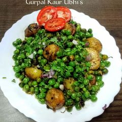 A picture of Butter Garlic Sprouted Green Peas & Potatoes Stir-Fry 🫛🥔🧈.