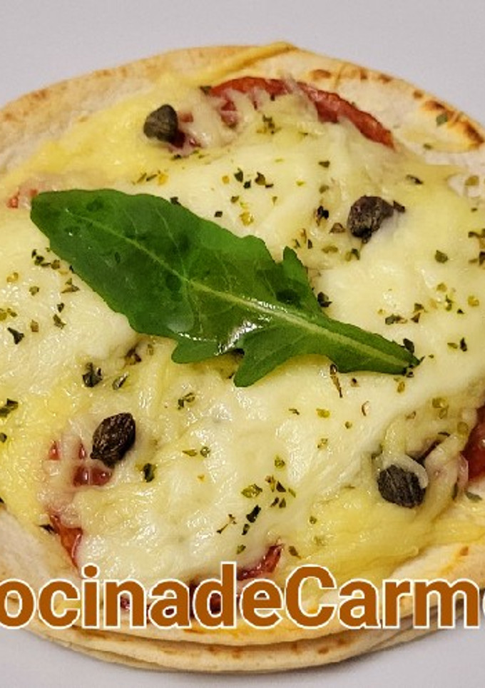 Una foto de Torti-pizzetta cuatro quesos