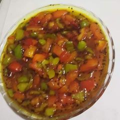 A picture of Vegetable of tomato & chilli.