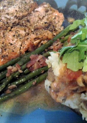 A picture of Balsamic dijon salmon w/sausage and arugula baked potato.