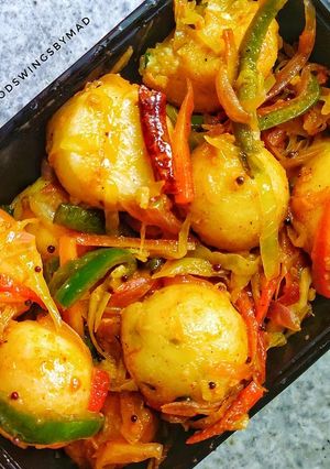 A picture of Veg Fried Stuffed Rava Balls.