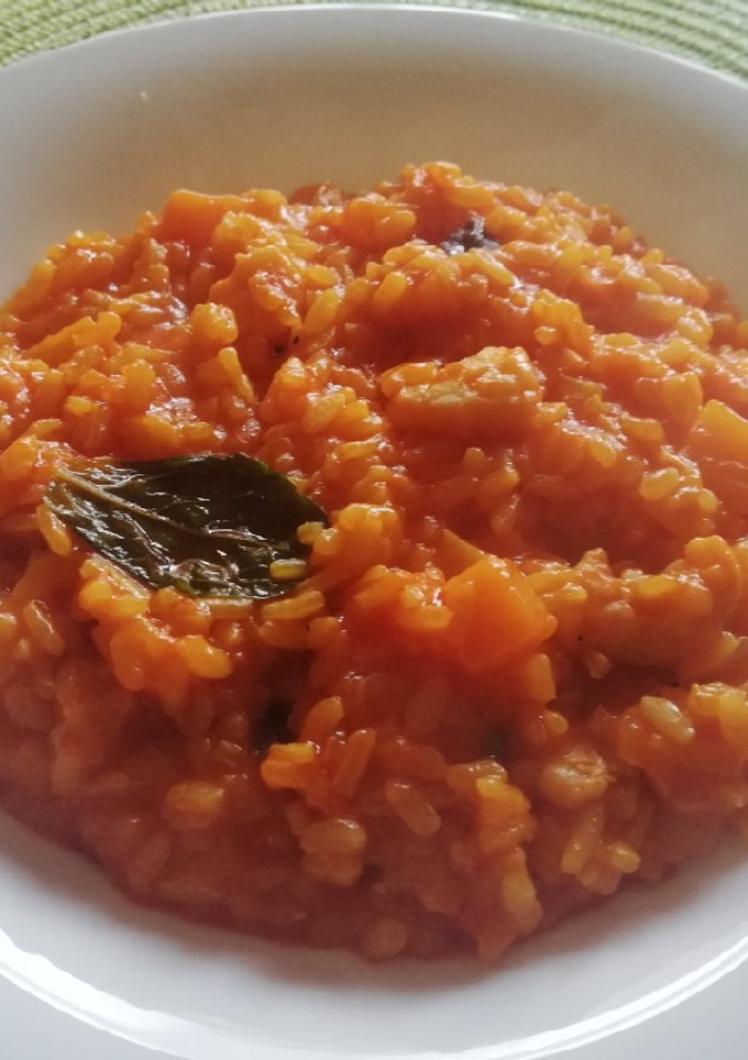 Una foto de Arroz con calabaza y gambas