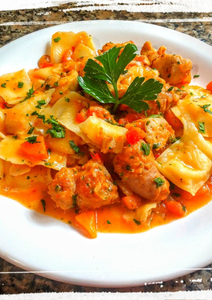 Una foto de Ravioles de Ricota con Salsa de Chorizo y Pollo