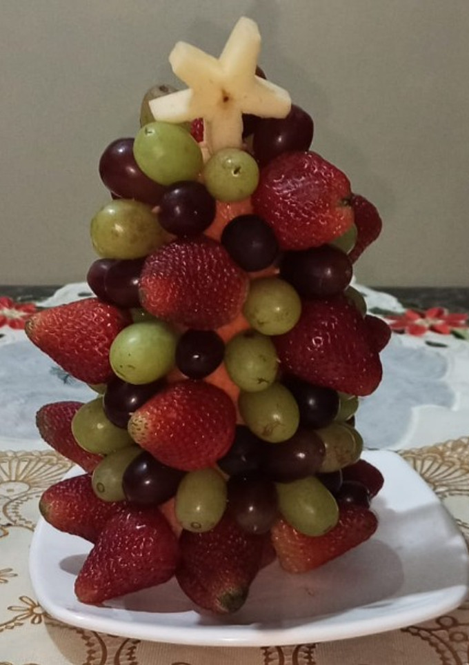 Una foto de Árbol de frutas, base zanahoria y manzana