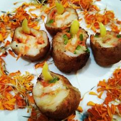 A picture of Cheesy Diya Bati.
