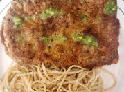 Una foto de milanesa de bola