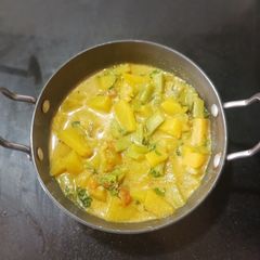 A picture of Cluster beans and pumpkin curry.
