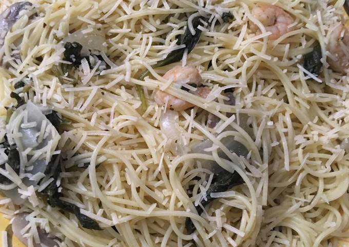 How to Prepare Homemade Buttery shrimp scampi in a white wine sauce over angel hair pasta #mycookbook
