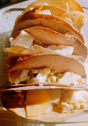Una foto de Fajitas Express. 4 quesos y jamón y queso