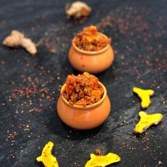 A picture of Haldi ka Aachar (fresh turmeric pickle).