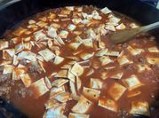 Una foto de raviolis de carne picada