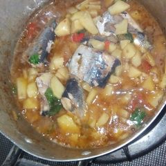 A picture of Jallof potatoes with fish.