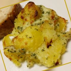 Potatoes with my parsley sauce A picture of Potatoes with my parsley sauce.