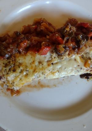 Una foto de Canelones rellenos con berenjena, ricota y nueces