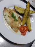 Tilapia con batata rústica