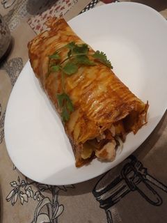 Una foto de Rollo de patata relleno