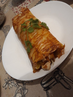 Una foto de Rollo de patata relleno