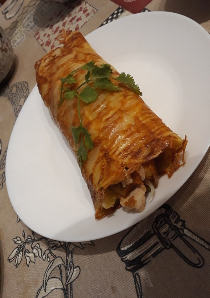 Una foto de Rollo de patata relleno