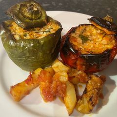 A picture of Greek Stuffed peppers (known as “politika gemista” in Greek).