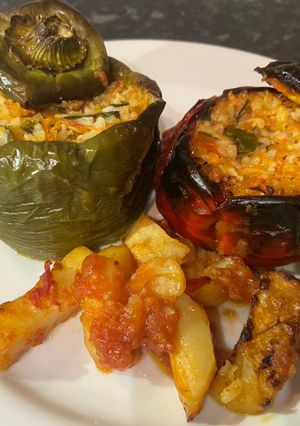 A picture of Greek Stuffed peppers (known as “politika gemista” in Greek).
