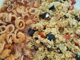 Chipirones /calamares y gambas en salsa acompañado de cuscús con verduras