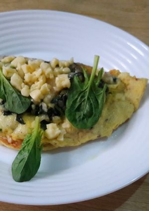 Una foto de Omelette de espinaca y queso. 🍃