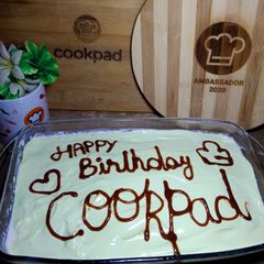 A picture of Three milk cake with Cookpad 🧡.