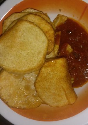 A picture of Fried yam with sauces.
