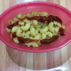 A picture of Tomato sauce cheese pasta.