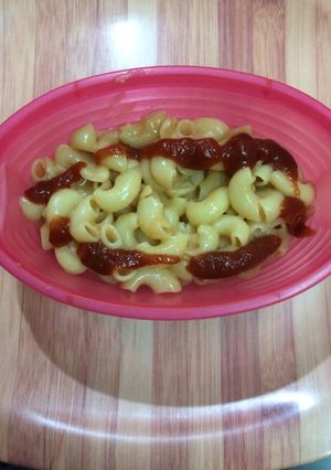 A picture of Tomato sauce cheese pasta.