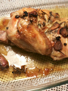 Una foto de Pollo al ajillo y romero al horno