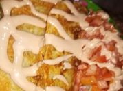 Una foto de pollo en salsa whisky