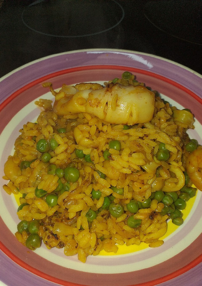 Una foto de Arroz con calamares