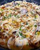 Spaghetti caldoso con almejas, coco, piparras y café