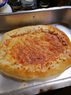 صورة لوصفة طريقة عمل بيتزا تونه محشيه أطراف بجبن كيري 😋😋😋