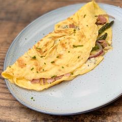 A picture of Asparagus, Ham and Blue Cheese omelette.