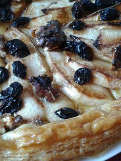 Una foto de Tarta de manzana, nueces y pasas al Pedro Ximenez