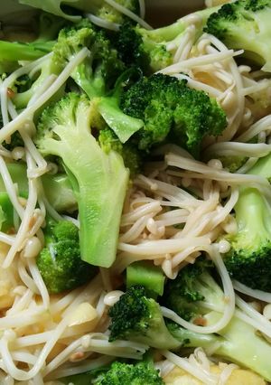 A picture of Broccoli with enoki mushroom and egg tofu.