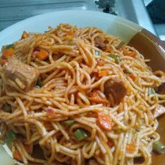 A picture of Spaghetti with vegetables.