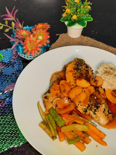 A picture of Chicken steaks with spicy mexican sauce.