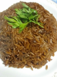 صورة لوصفة رز بسمتي بالبصل خطير مع السمك