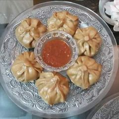 A picture of Whole wheat flour Momos with chutney.