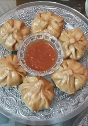 A picture of Whole wheat flour Momos with chutney.