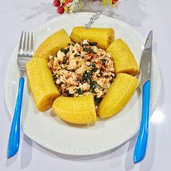 Boiled Plantain with vegetable eggs sauce 😋 A picture of Boiled Plantain with vegetable eggs sauce 😋.
