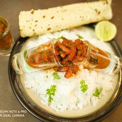 A picture of Rice with Rajma Shots.