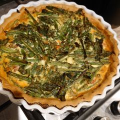 A picture of French Bean, spininch & roast tomato quiche.